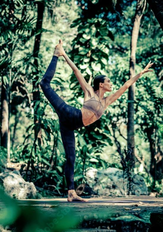 yoga pose in forest